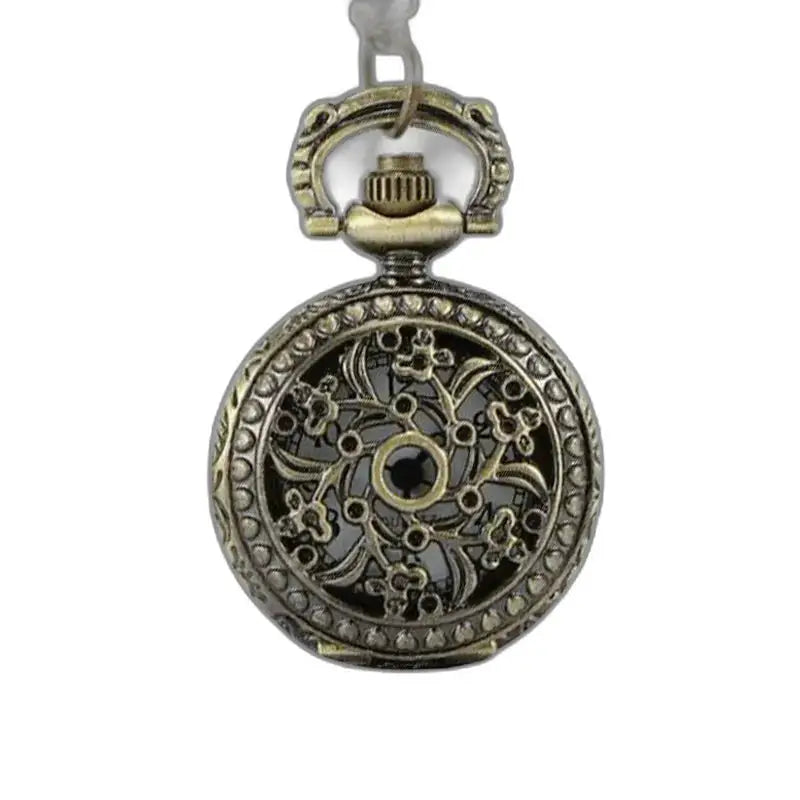 Pendentif vintage en forme de montre avec un design en bronze ornée